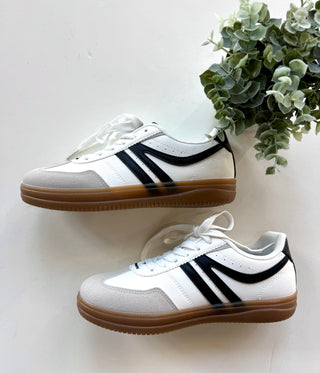 White & black trim sneakers