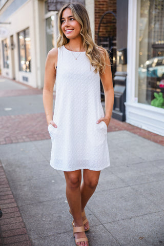 White sleeveless textured shift dress