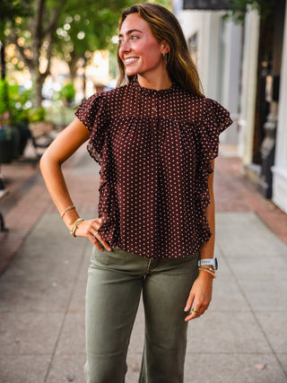 Brown frilly polka dot blouse