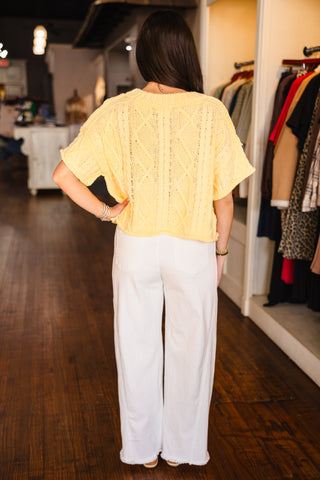 Drop shoulder cable knit sweater