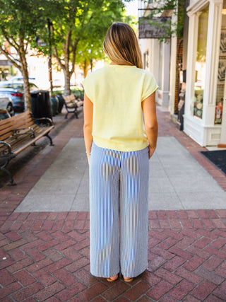 Raw Edge Sleeveless Button-Down Cardigan