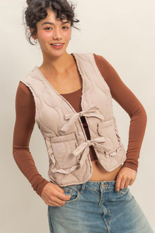 Taupe quilted tie front vest