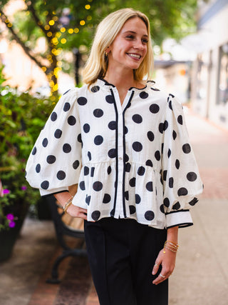White polka dot button down peplum top
