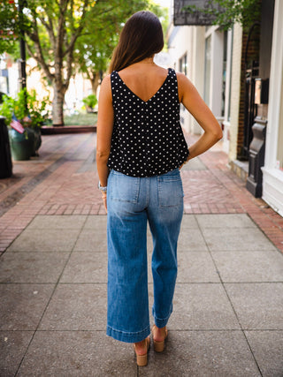 Black polka dot braided strap top