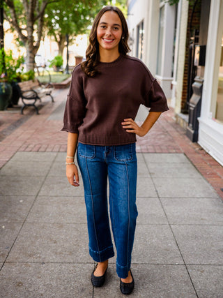 Exposed seam drop shoulder half sleeve sweater