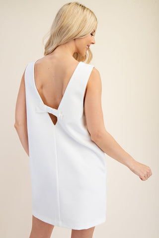Sleeveless dress with back bow detail