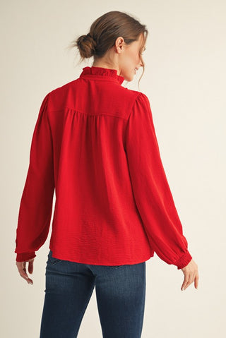 Red ruffle trim blouse