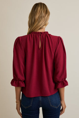 Burgundy ruffle trim blouse