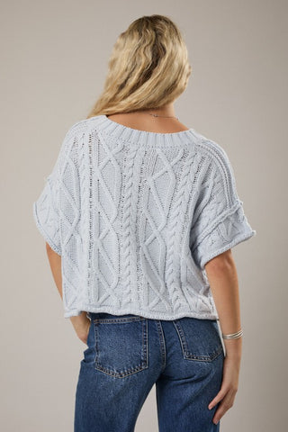 Drop shoulder cable knit sweater