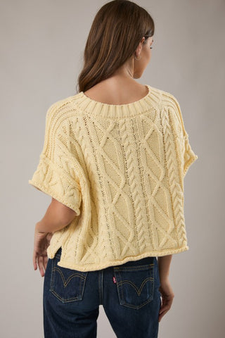 Drop shoulder cable knit sweater