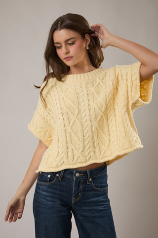 Drop shoulder cable knit sweater