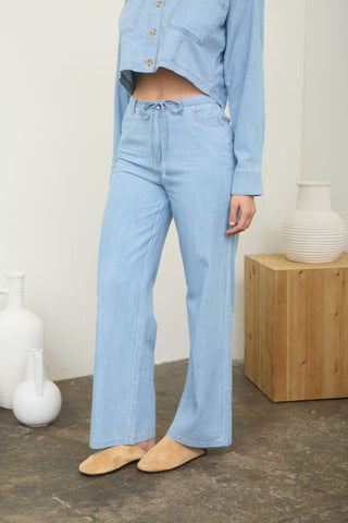 Washed denim tie front pants