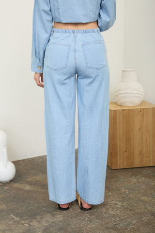 Washed denim tie front pants