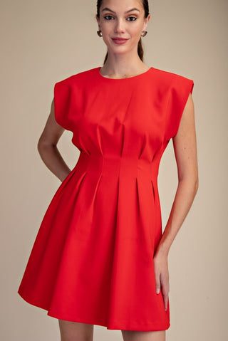 Make a statement in this red, front pleated dress!