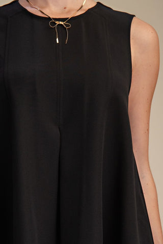 Black sleeveless pleated dress