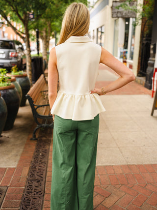 Entro Cream zip front peplum top