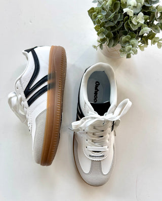 White & black trim sneakers