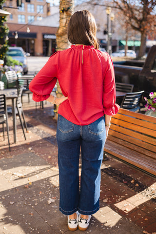 Burgundy ruffle trim blouse