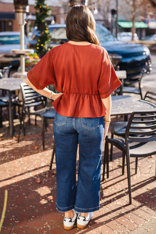 Peplum lace trim top
