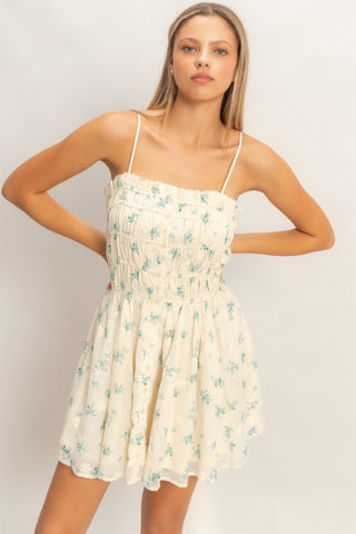 Woman wearing a summertime floral dress 