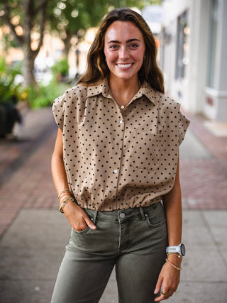 Taupe polka dot collared bubble hem top