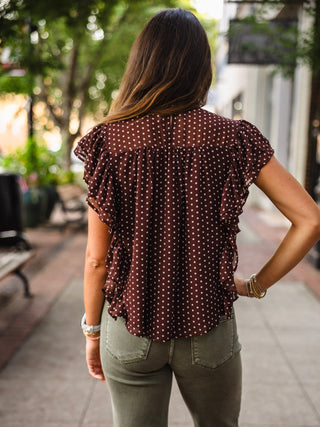 Brown frilly polka dot blouse