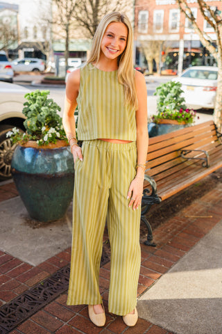 Woman in an olive striped set