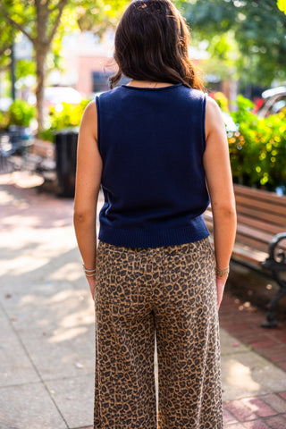 Raw edge sleeveless cardigan