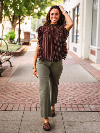 Brown frilly polka dot blouse
