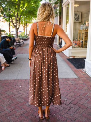Polka dot smocked midi dress