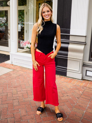 Sleeveless mock neck ruched top