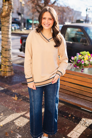 Tan varsity trim V neck pullover