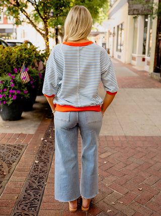 Blue and orange stripe pullover