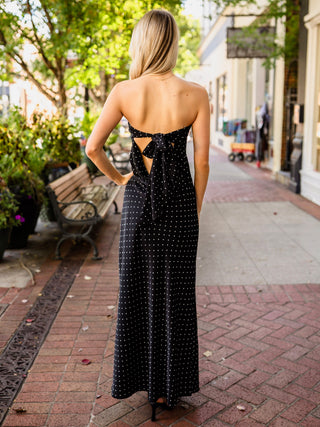 Black polka dot strapless maxi dress
