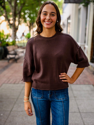 Exposed seam drop shoulder half sleeve sweater