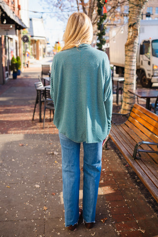 Oversized striped turtleneck top