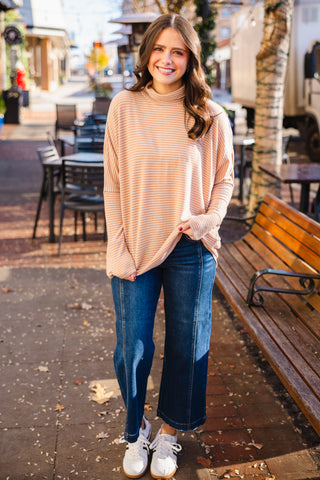 Oversized striped turtleneck top