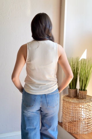 Sleeveless snap button top
