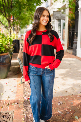 Red & black checkered sweater