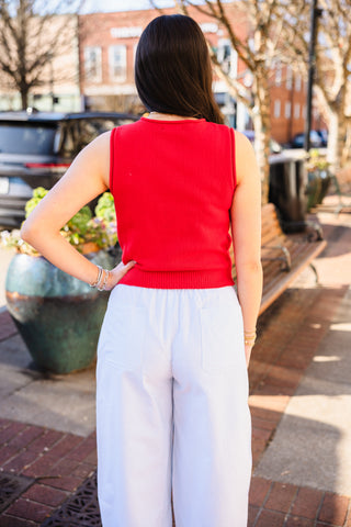 Raw edge sleeveless cardigan