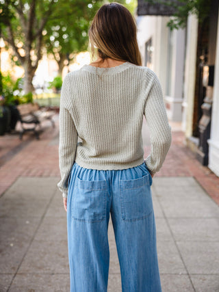 Sage wavy textured knit cardigan with scallop trim