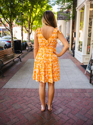 Orange floral print dress