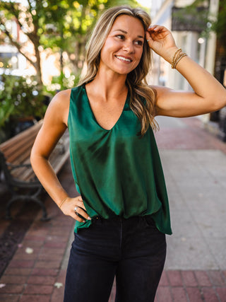 Sleeveless V neck bubble hem top