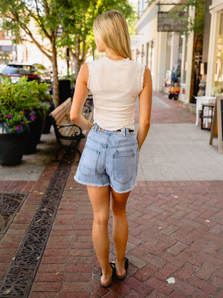 Polka dot ruffle trim sleeveless top