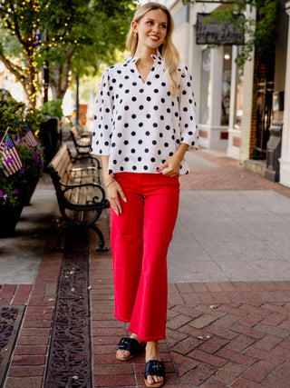 White & black polka dot blouse