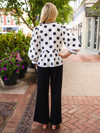 White polka dot button down peplum top
