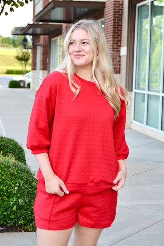 Red textured half sleeve top