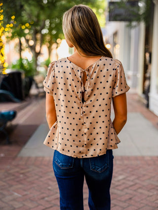 Polka dot puff sleeve peplum blouse