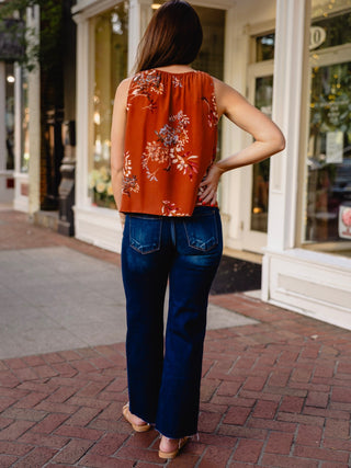 Brown floral print sleeveless blouse
