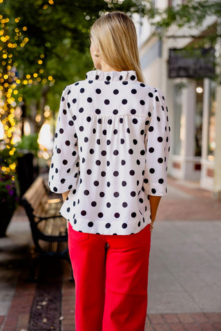White & black polka dot blouse
